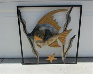 Metal fish wall plaque. 20" wide x 20" tall. PRICE: $25.00
