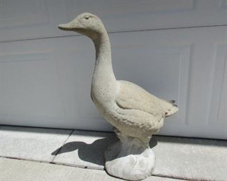 Cement goose. Approximately 24.5" tall x 21" long (from beak to tail) x 9" wide. PRICE: $35.00.