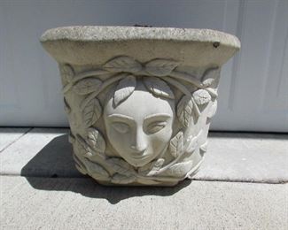 Cement planter with face. 12.5" w x 12.5" d x 11" tall. PRICE: $30.00