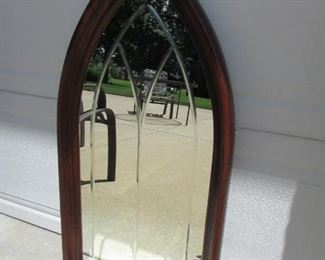 Gothic-style wall mirror with cherry finish. 36.5" h x 18" w x 2" deep. PRICE: $45.00