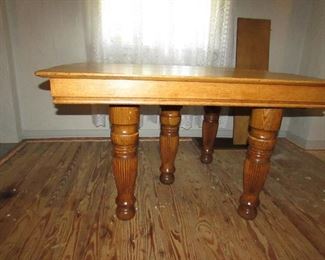 Additional detail of antique oak harvest table.