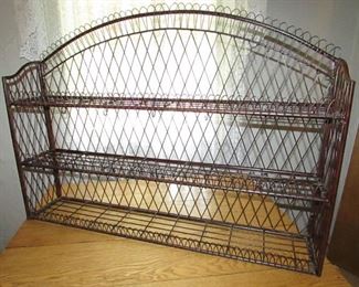 Quality heavy metal wall shelf. Collapses flat for transport/storage and has removable shelves. 44.75" w x 33" tall x 8.5" deep. PRICE: $150.00