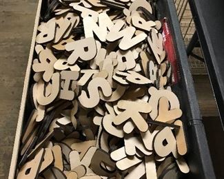 Unpainted professionally cut lazor cut out letters on profect paneling