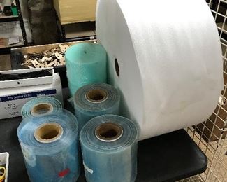 Rolls of heat shrink and packing material 
