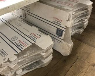 Boken down Postal packaging boxes