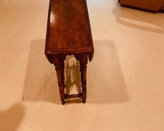 Drop leaf table.  It is big.  Just looks small here.  $300.  Next picture shows it open 