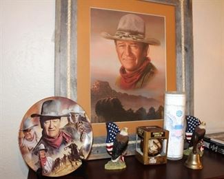 John Wayne shrine, with framed print, books, magazines, plates, VHS movies