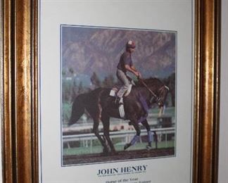 one of two John Henry framed posters