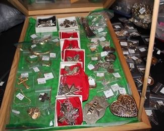 Lots of jewelry...gold, sterling, costume, watches
