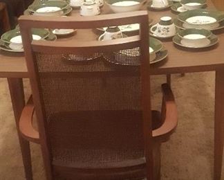 501 MID CENTURY DINING ROOM TABLE AND 6 CHAIRS . $150 PREVIOUS PICTURE OF CHINA IS THE CHINA ON THE TABLE
