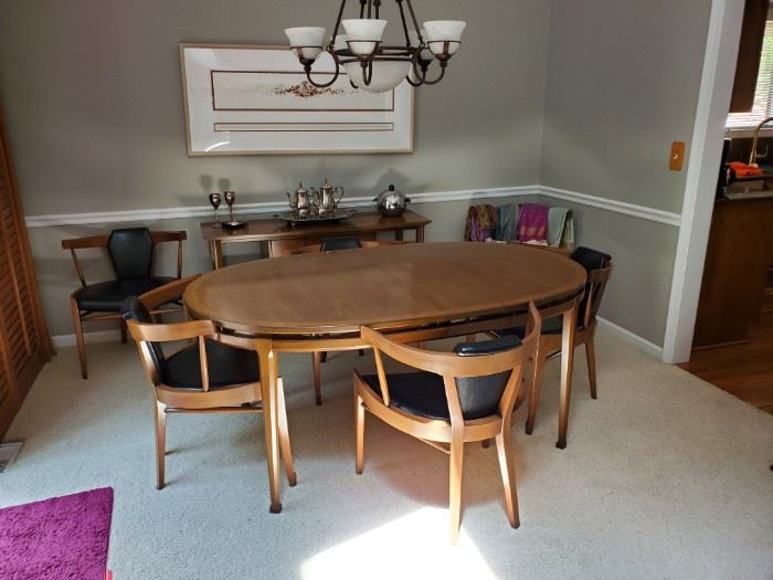 Great mcm table with 8 chairs and leaves