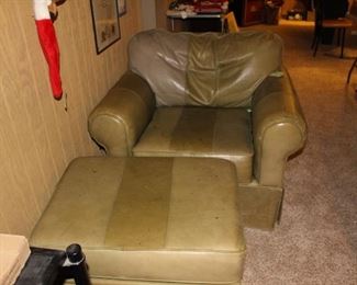 Green leather chair and ottoman