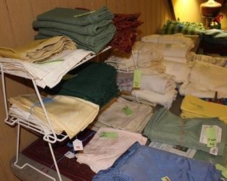 Lots of sheets, bedding, towels