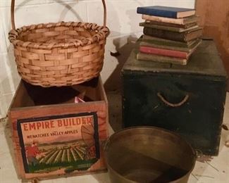 fruit boxes, woven basket, vintage books, metal pail