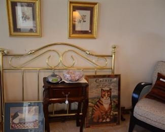 king brass headboard, table, chair and art