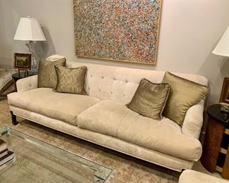 $1,200 Custom recessed arm two cushion crushed velvet sofa with tufted back in cream velvet. Very good condition. 33"H x 36"D x 90"W.