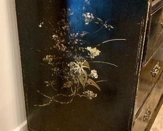 Side view. American Chippendale black lacquered chest with gilt accents; 40.75"H x 20.75"D x 42.5"W