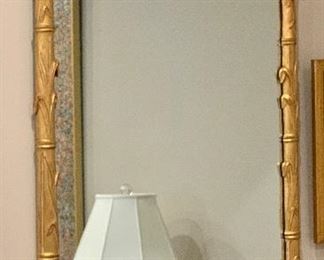 $750; Carved wooden bamboo mirror; 52"H x 37.5"W