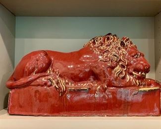 Detail: 20th Century glazed ceramic lion resting on pedestal