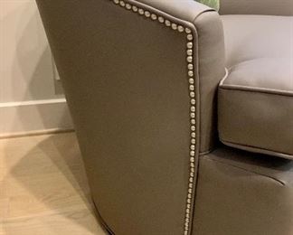 Detail: Side view of barrel swivel chair.