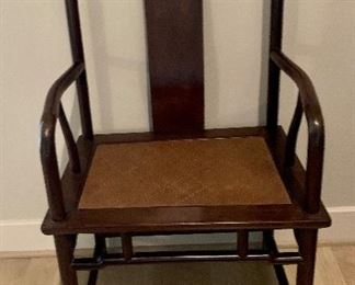 $350; Rosewood armchair with cane seat; 39"H x 17"D x 23.25"W