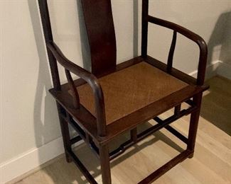 Detail: Rosewood armchair with cane seat