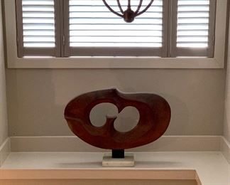 Detail; Wooden modernist sculpture on base