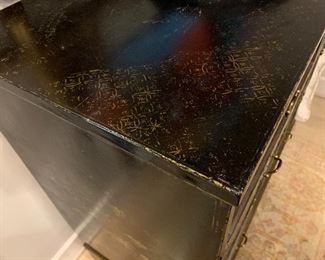 Detail: American Chippendale black laquered chest with gilt accents