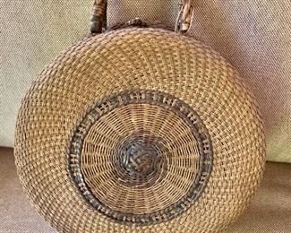$75; Vintage woven round handbag. 9.25"D