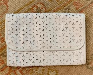 $25 Carlos Falchi clutch 12'W x 8"H