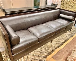 $3,500; Baker "Chocolate" Leather four cushion sofa with rolled arm pillows; Very good condition; 32"H x 32"D x 98"L