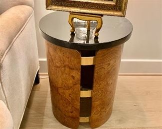 $750 each. Round marble topped mid century table made of burled wood with brass fittings. 1 of 2 available; Approximately 22" H, 16" D