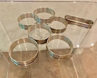 $50 for set of 7 sterling napkin rings (approx 1.5" diameter)