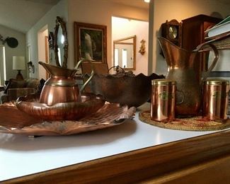 Copper pitchers, bowls, salt & pepper shaker, platters