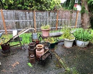 potted plants, garden art, vintage milk jugs