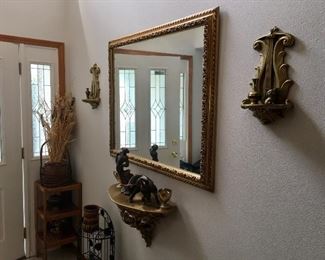 Gold mirror, wall sconces, side tables, home decor