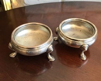 Price: $200. Tiffany Sterling Makers pair master salts with initials "A McC B." No inserts and inside bowls show scratching. Weight of pair: 154g. Measure approx: 1.5H x 3W