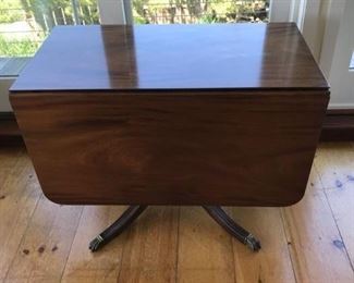 Make an offer: was $250. Mahogany drop leaf table with Duncan Phyfe base. See photo of table top for condition. 29H x 40W x 21.5D. Table extends to 62W.
