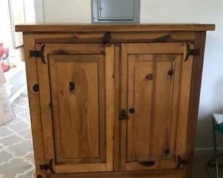 Make an offer: was $150. Entertainment center / cupboard with single drawer. Very good condition. The color of the wood is closer to that shown in photo of side of piece. 48H x 45W x 23.5D
