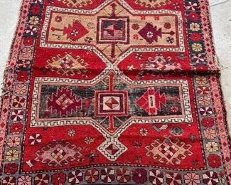 Old Persian rug. 4’ x. 7.5 ‘. $ 450.