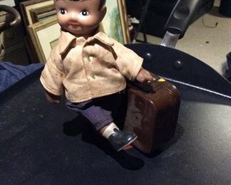 Vintage Chinese wind-up tin toy
Boy with Blue Hat & Suitcase $75.