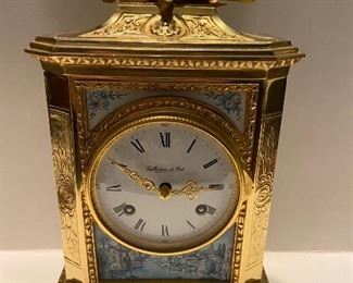 Brass clock. Heavy. 12” $ 350.