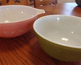 (2) Vintage Pyrex Bowls: Pink Gooseberry and Green $45.00 for the pair. Both items have wear, very loved.