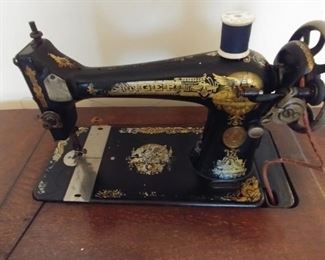 Vintage Singer Manual Sewing Machine with Oak Cabinet 35.5" by 28.5" by 17" $299.00