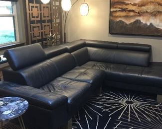 Black leather sofa with built in headrest $1250