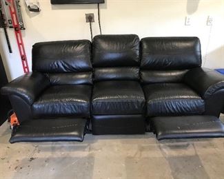 Pleather sofa with two recliners $250