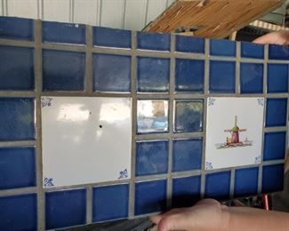 Several panels of vintage hand painted delft tiles