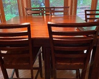 Hi low table with 11 chairs