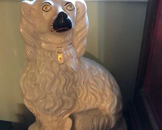 1 of a pair of large antique Staffordshire dogs