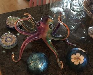 One of the most awesome & unique individual items in this house, in my opinion: A mezmarizing Colorful Art Glass Cephalopod... that's an octopus! This is pretty large...those are standard sized paperweights.